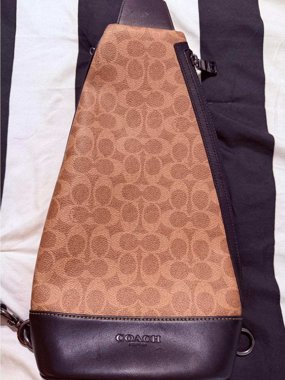 COACH woman or Men’s Brown Signature Canvas Sling Bag
